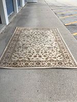 Full view of the rectangular Turkish area rug showing overall size and pattern.