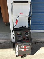 Rear/side view with tubular handle and clamp attachment