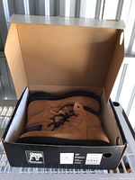 Kodiak Pathfinder boots shown inside the open box from top view.