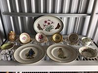 Full view of all china pieces displayed on rack