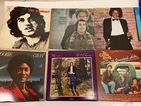 Front covers of six vinyl albums including Michael Jackson, Joe Cocker, Simon & Garfunkel with Dobie Gray, BJ Thomas, and The Grass Roots.