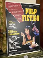 Photo showing the full Italian Pulp Fiction movie poster board with title, credits, and image of Uma Thurman.