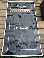 Laminated poster showing the Marshall Lead 12 Amp stack amplifier graphics and logos, with control knobs illustrated at the top.