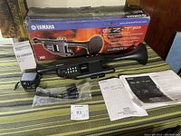 Boxed Yamaha EZ-TP trumpet with power supply, cables, manuals and original packaging