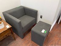 Gray Coalesse armchair and ottoman set photo showing overall condition and shape.