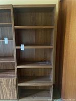 Full view of the wood veneer bookshelf showing all shelves and overall structure.