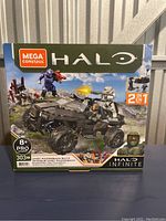 Front of the boxed Mega Construx Halo Infinite UNSC Razorback Blitz set, shows 2-in-1 vehicle build and age recommendation