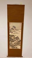 Full hanging scroll showing paper artwork and fabric mounting
