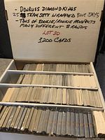 Box containing approximately 3200 cards with handwritten sign describing lot contents, divided into sections.