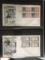 Close-up of two First Day Covers featuring a 13 cent U.S. Air Mail stamp with Liberty Bell illustration, and American Credo series stamps with George Washington portrait.