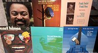 Photo of several jazz LPs including The Gene Harris Trio Plus One, The Gene Harris All Star Big Band Tribute to Count Basie, Frank Foster & Frank Wess, Earl Hines, The Earl Hines Trio, The Ray Brown All Stars
