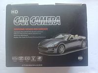 Box of the car camera, black, labeled HD Car Camera, showing a convertible car image and features.