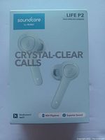 Front of box showing brand, model, and key features such as crystal-clear calls, Qualcomm aptX, 40H playtime, and superior sound.