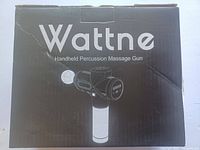 Front of product box labeled Wattne Handheld Percussion Massage Gun with image of the device.