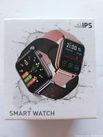 Box front showing two smart watches with black and pink bands, IPS brand logo, and 'SMART WATCH' text.