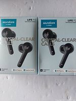Two boxed pairs of Soundcore Life P2 true wireless earbuds by Anker, front view showing packaging graphics and product name.