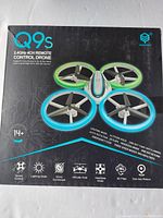 Box with image and specs of Q9s 2.4GHz 4CH Remote Control Drone