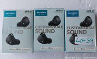 Three boxed units of Soundcore Life A1 wireless earbuds, front view showing packaging and product branding.
