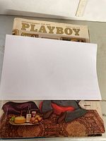 Top view showing the Playboy logo and cover art of a January 1975 issue.