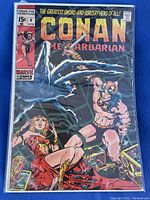 Front cover of the Conan the Barbarian No. 4 comic book featuring Conan fighting a clawed hand and a woman in red, with pricing and Marvel logo.