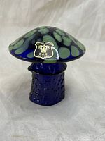Front view showing overall shape, colors, and original Golden Crown E & R Sweden label on mushroom cap.