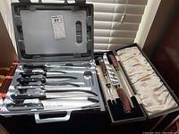 Zemex 2000 cutlery set in grey plastic case showing various knife blades and handles.