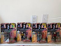 Four Star Trek Generations trading figurines in original packaging lined up in a row.
