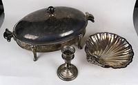 Overview of all three items in the lot showing tarnish and general condition