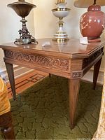 Front and top view of wooden square end table with three lamps on top, showing size, shape and surface condition.