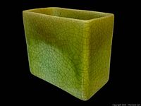 Side angle view of the square green crackle glaze vase showing the crackle pattern and gradient color effect.