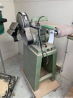 Front view showing belt and disc sander mounted on swivel stand