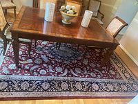 Full view under dining table with chairs