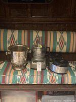 KitchenAid food processor bowl, base with control panel, and Cuisinart ice cream machine base alongside a metal bucket with handles