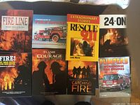 Photo showing 8 assorted fire service and fire engine books with photographic and illustrated covers.