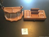 View of both vintage wood dresser organizers, side by side on a dark surface, showing their size and layout