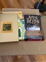 Box view showing gold slipcase of The Hobbit 50th Anniversary, green-map patterned book cover, and After the Ring anthology.