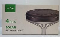 Original retail packaging box for 4 pcs Litom solar pathway lights, shows brand and product image clearly.