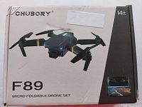 Photo shows the original box of the Chubory F89 Micro Foldable Drone Set with an image of the black drone and remote controller on the front.