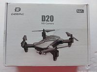 Front of retail box showing Deerc logo, model D20, and HD Camera label. Suitable for ages 14+.