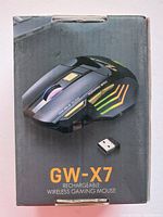 Box front showing image of the GW-X7 rechargeable wireless gaming mouse with USB receiver visible.