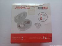 Front view of the JINGHAO JR-A39 hearing aids packaging showing product image, brand, model, and charging information.