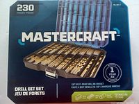 Front view of Mastercraft drill bit set box showing 230 pieces with titanium nitride coating and 1-year warranty details