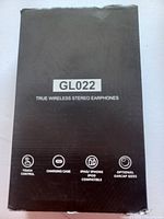 Box of GL022 true wireless stereo earphones with product details and features.
