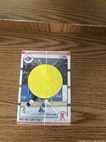 Front view of the sealed 1990-91 Score NHL hockey card set with Wayne Gretzky card visible through wrap.