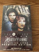 Front cover of the X-Files Topps Master Visions collector cards box showing Agents Mulder and Scully.