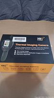 Box of HTI Thermal Imaging Camera showing brand and product usage details