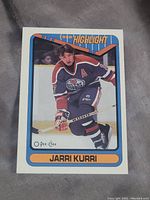 Front of 1990 Jarri Kurri O-Pee-Chee hockey card showing Jarri Kurri skating in Edmonton Oilers uniform.