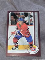 Front of Saku Koivu hockey card showing player in Montreal Canadiens uniform on ice.