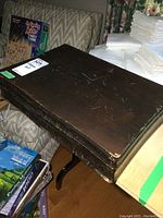 Closed vintage wooden chest with visible wear and scratches on the surface.