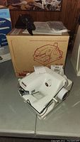 Machine with box in background